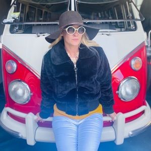 SOLD Cozy Cute Black Faux Fur bomber jacket.